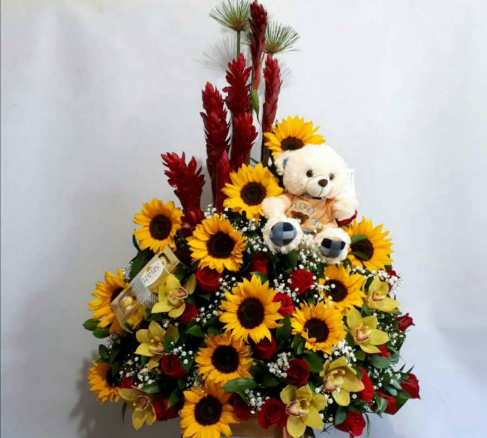 Ramo de girasoles pétalos de amor.